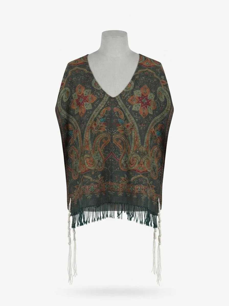 A paisley garment repurposed into hand-tied tzitzit